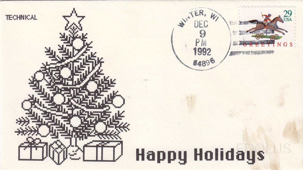 The cachet features a black-and-white pixel/computer-style illustration of a decorated Christmas tree with ornaments, a star topper, and wrapped gifts beneath it, with 'Happy Holidays' printed in bold black text at the bottom right. The word 'TECHNICAL' appears in the upper left corner identifying …