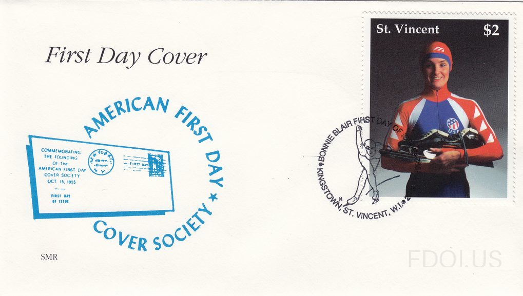 This First Day Cover features a cachet from the American First Day Cover Society (AFDCS) commemorating the founding of the society on October 15, 1955, rendered in blue ink with an illustration of an early FDC and circular text. The $2 stamp from St. Vincent depicts speed skater Bonnie Blair in her…